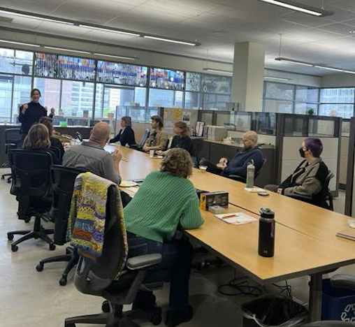 Group of students, faculty, and community members gather at the Portland City Archives with Dr. Callaci