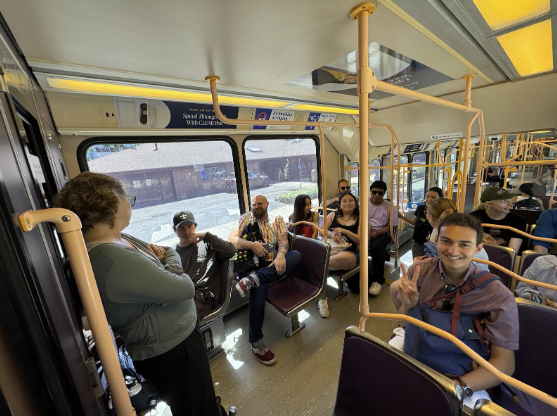 A group of UNST students explore Portland on the MAX.