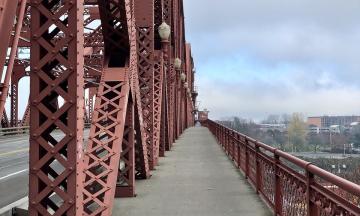 A perspective photo of the Broadway Bridge in Portland, OR