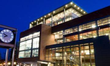 The PSU rec center lit up at night