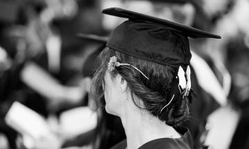 faceless image of the back of a graduate's head
