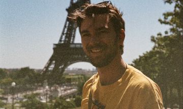 Wally McAllister in front of the Eiffel Tower