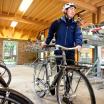 image of a student with a bike