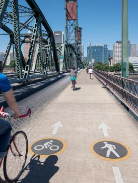 Cyclist on Hawthorne Bridge