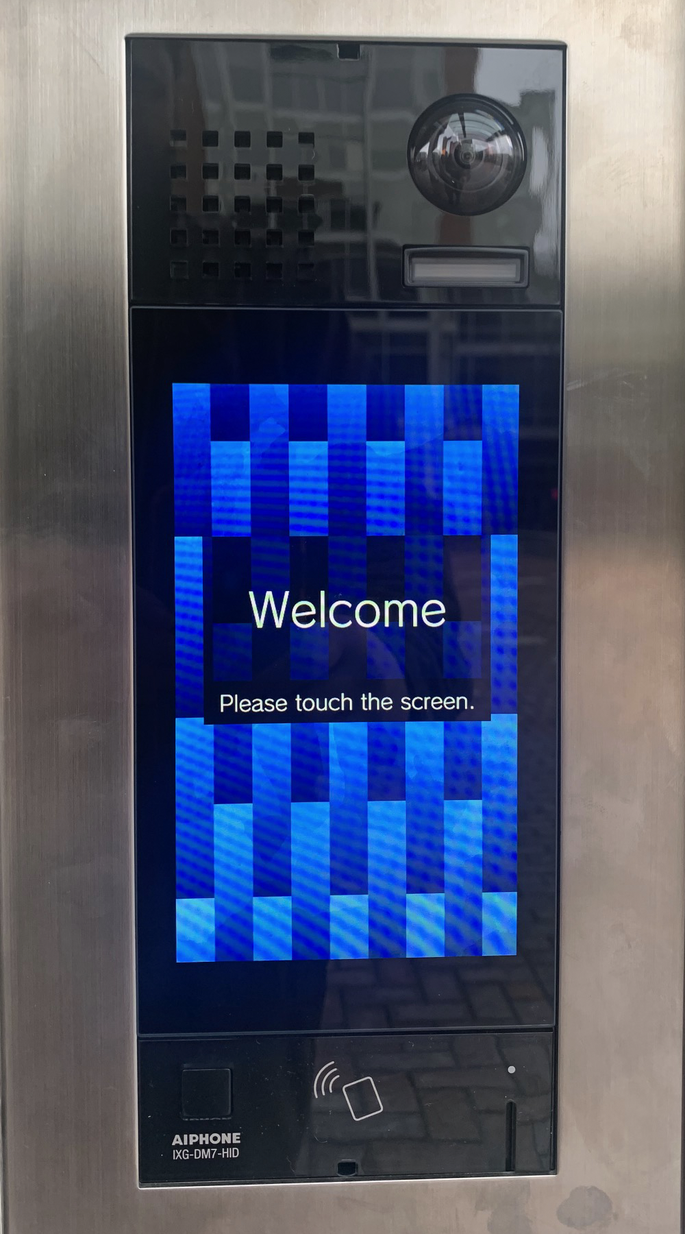 Image of welcome pad screen: Welcome: Please touch the screen to begin