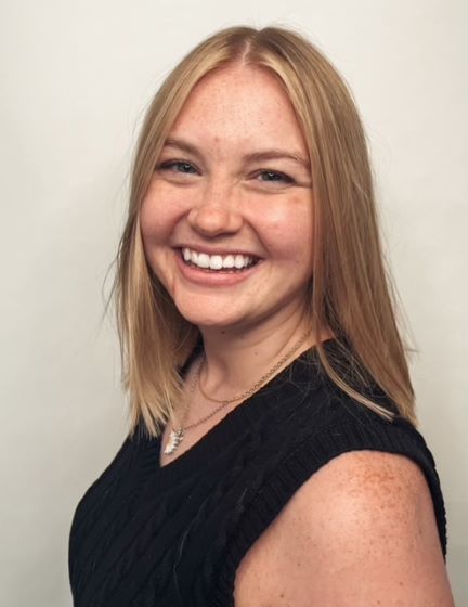 smiling grad student