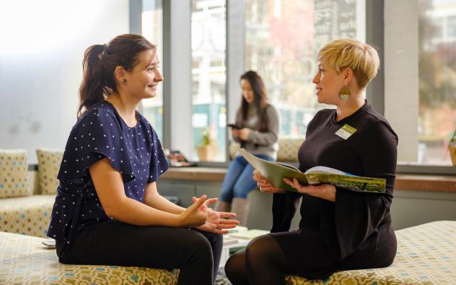 Student meeting with an admissions counselor