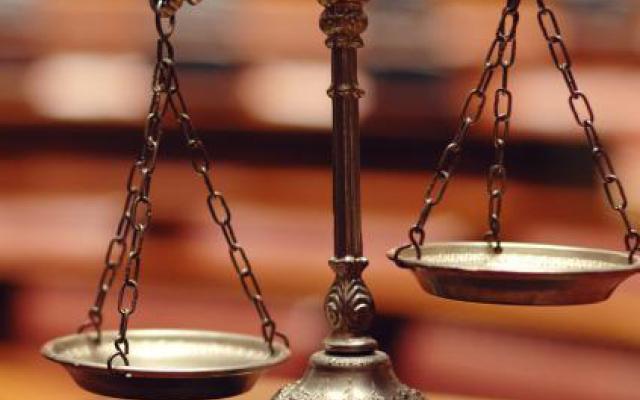 Stock image of a scale in court