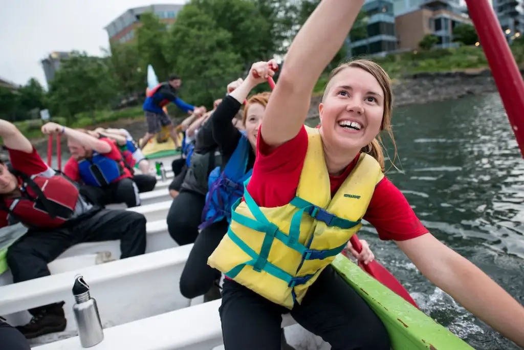 Students canoeing on the water