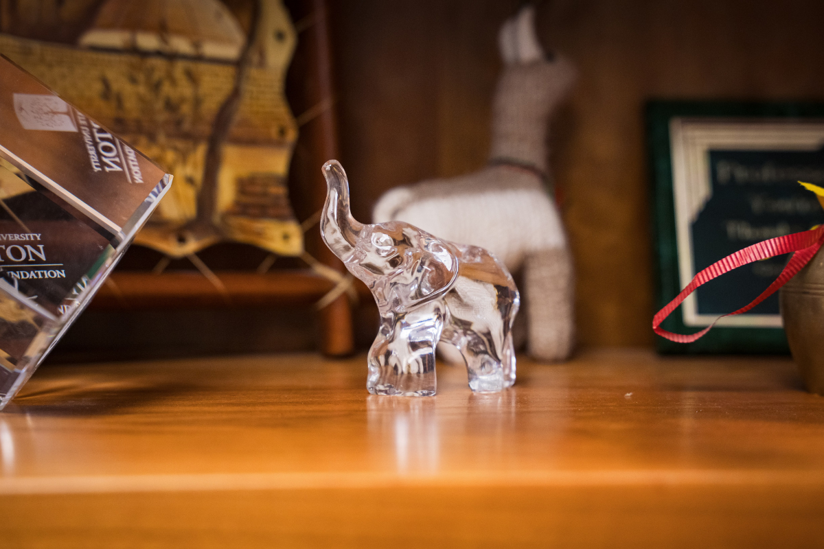 clear glass elephant sculpture in Dean Bowman's office