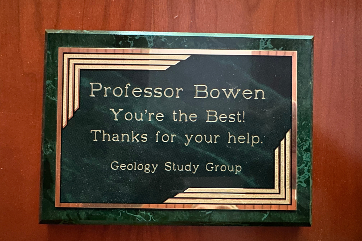 Plague presented to Dean Bowman by geology students. The misspelled his name Professor Bowen