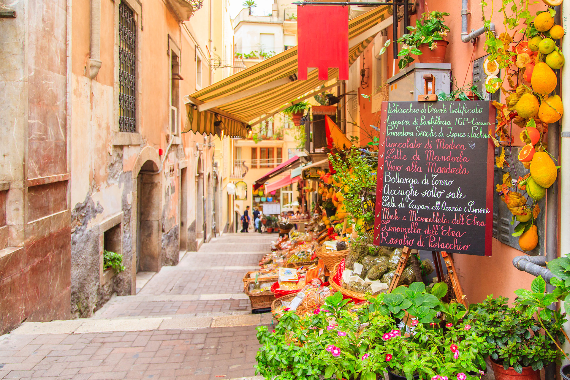 Side street in Italian city a with a vegetable/fruit market