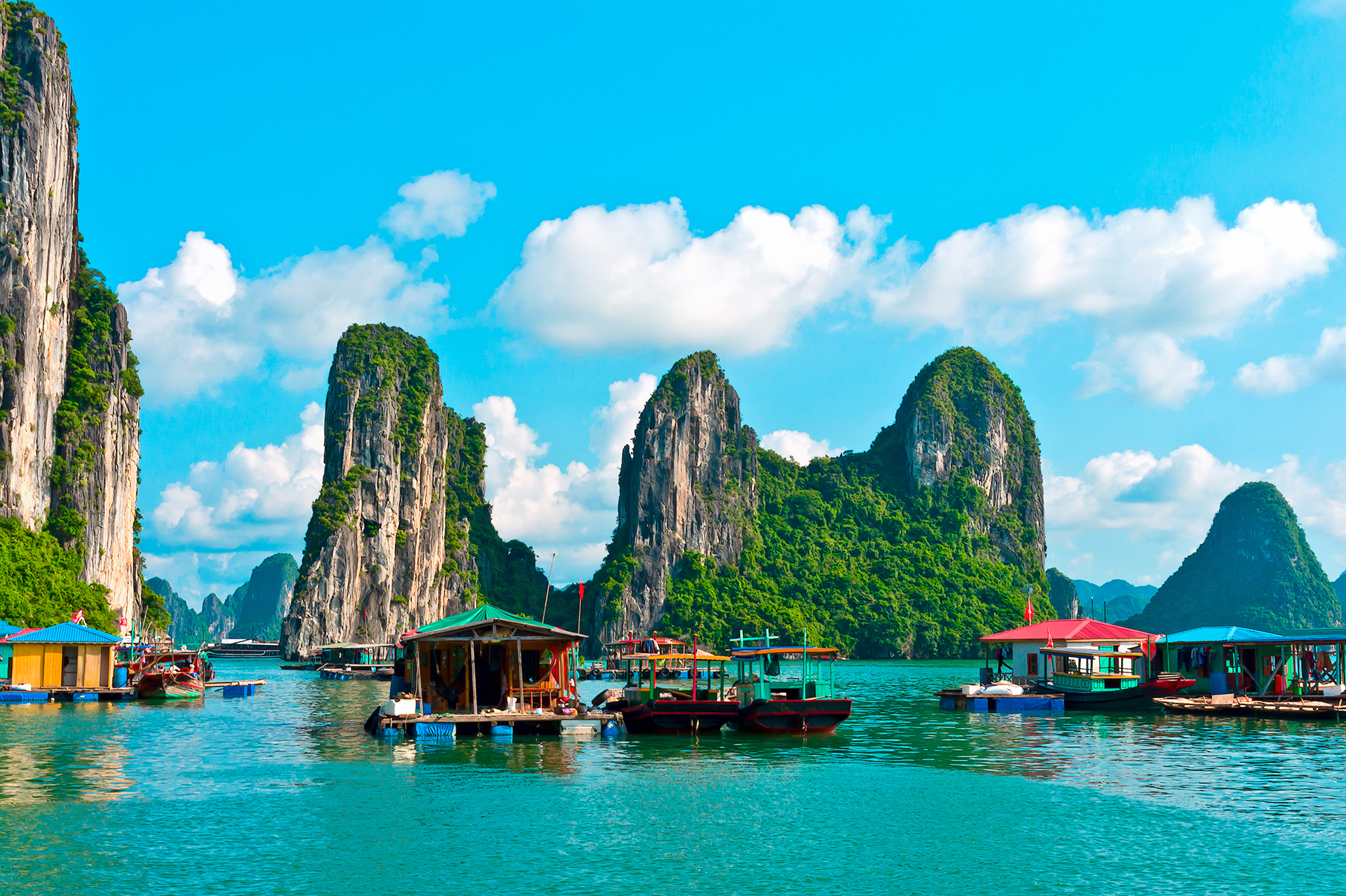 Floating village and rock islands in Halong Bay, Vietnam, Southeast Asia