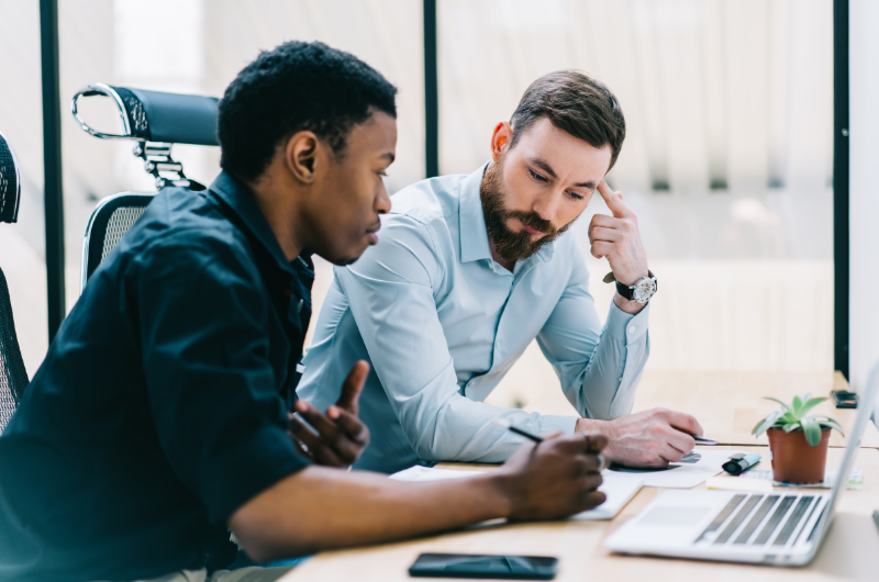 Two people working together