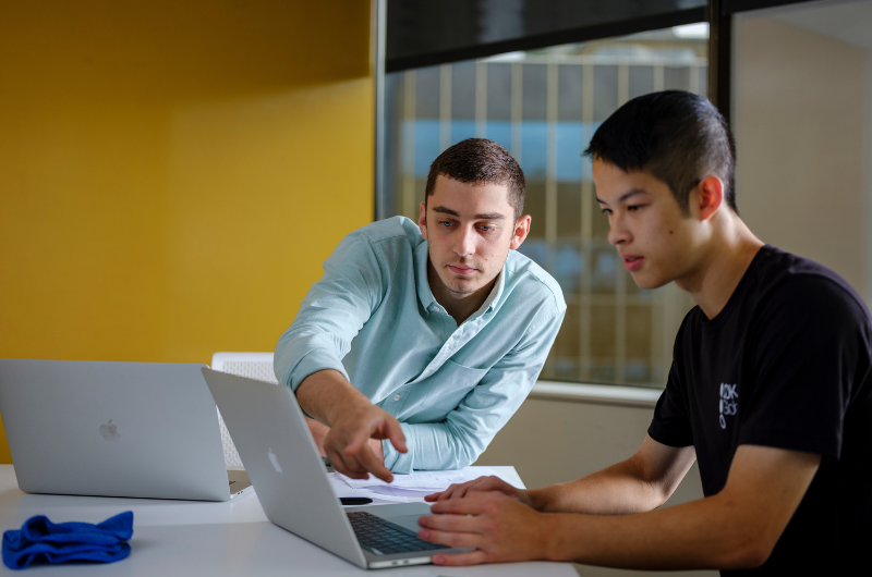 Two people working on a project