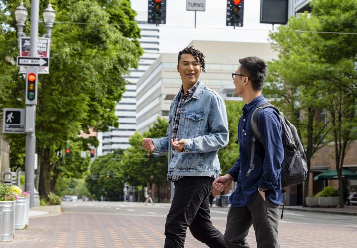 Students walking across the street on the PSU campus